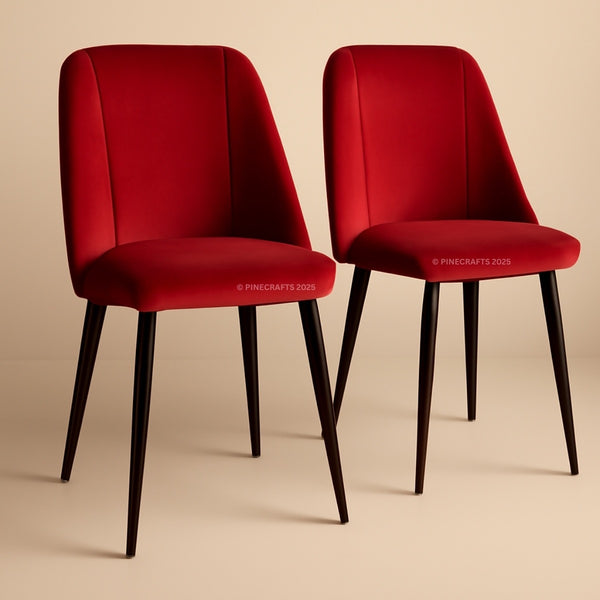 Two red chairs with black legs on a beige background