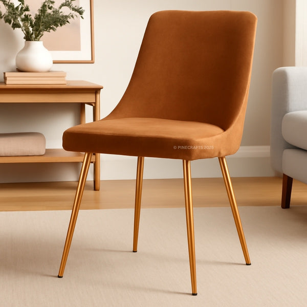Brown chair with gold legs in a room setting