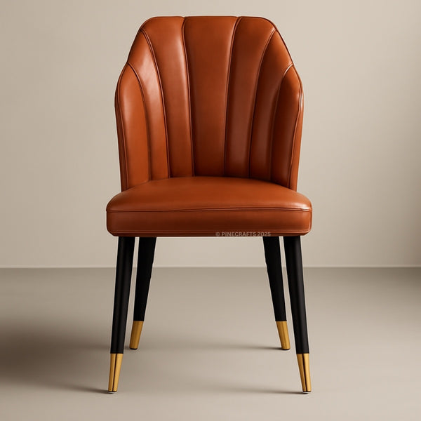Brown leather chair with black legs and gold tips on a beige background