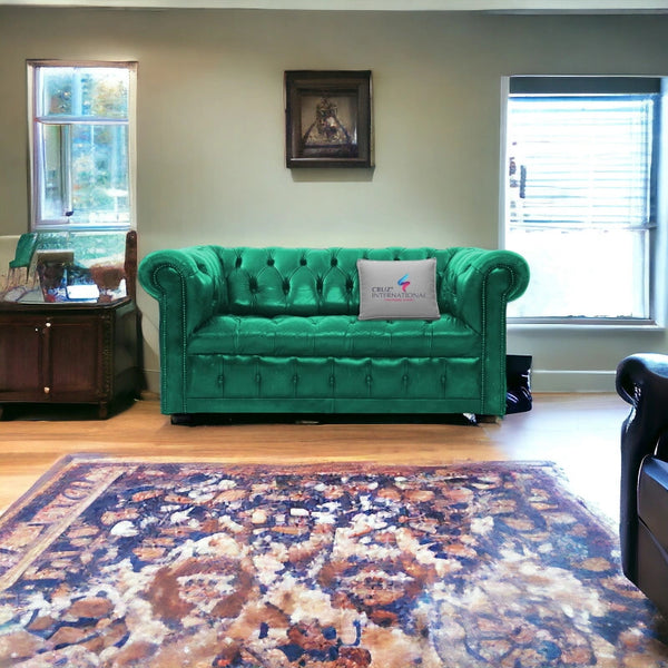 Emerald green tufted sofa in living room with CRUZ INTERNATIONAL pillow, decorative rug, and classic furniture.