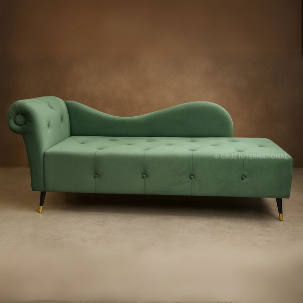 Green sofa with tufted backrest and button details on a brown background