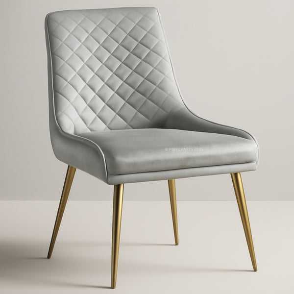 Gray quilted chair with gold legs on a light gray background