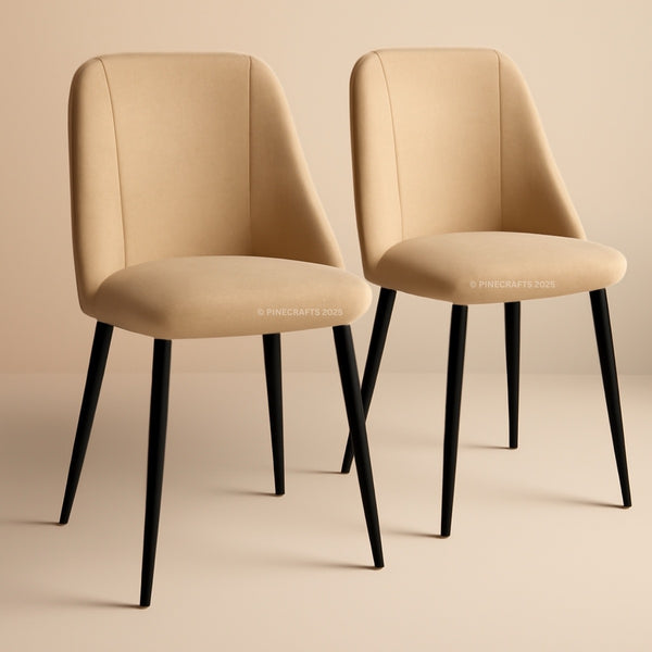 Two beige chairs with black legs on a beige background