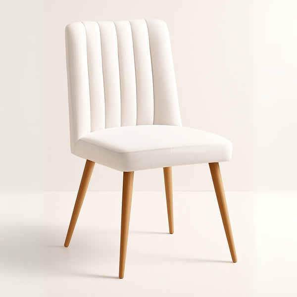 White chair with wooden legs on a light beige background