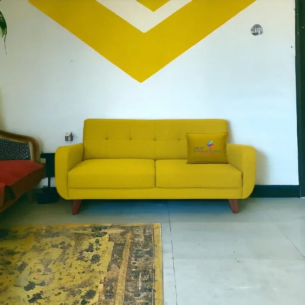 Modern yellow sofa with CRUZ INTERNATIONAL pillow in stylish living room, contemporary home furniture